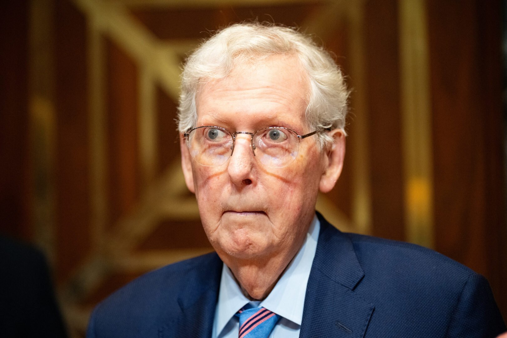 Sen. Mitch McConnell, R-Ky., arrives to chair a Senate Defense Appropriations Subcommittee hearing on May 19, before his hospitalization in mid-June. 