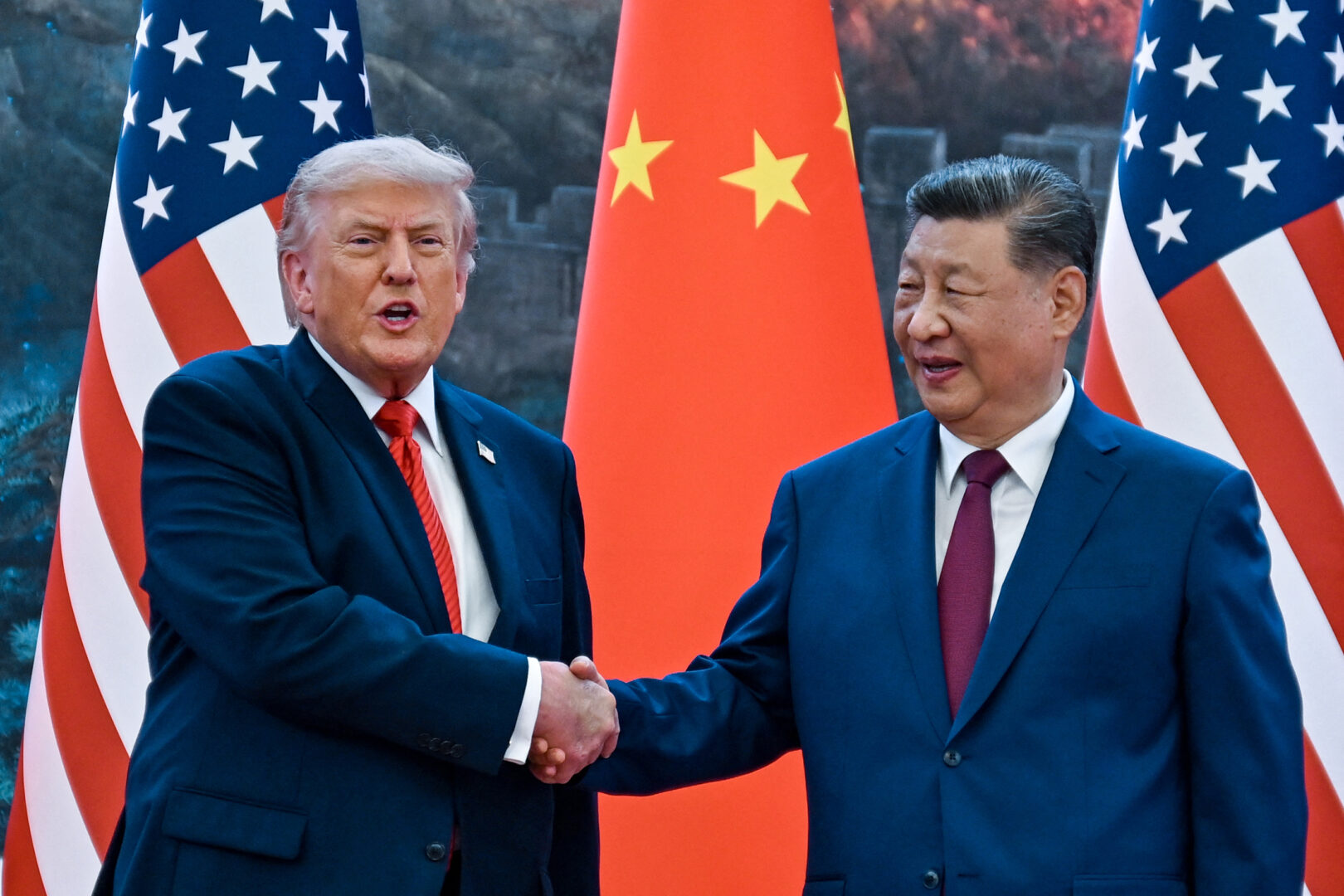 President Donald Trump shakes hands with China's President Xi Jinping at the Great Hall of the People in Beijing on May 14, 2026. 