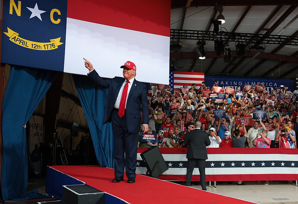 President Donald Trump greets supporters Wednesday at a rally in Gastonia, N.C., to drum up support for Republican Senate nominee Michael Whatley.