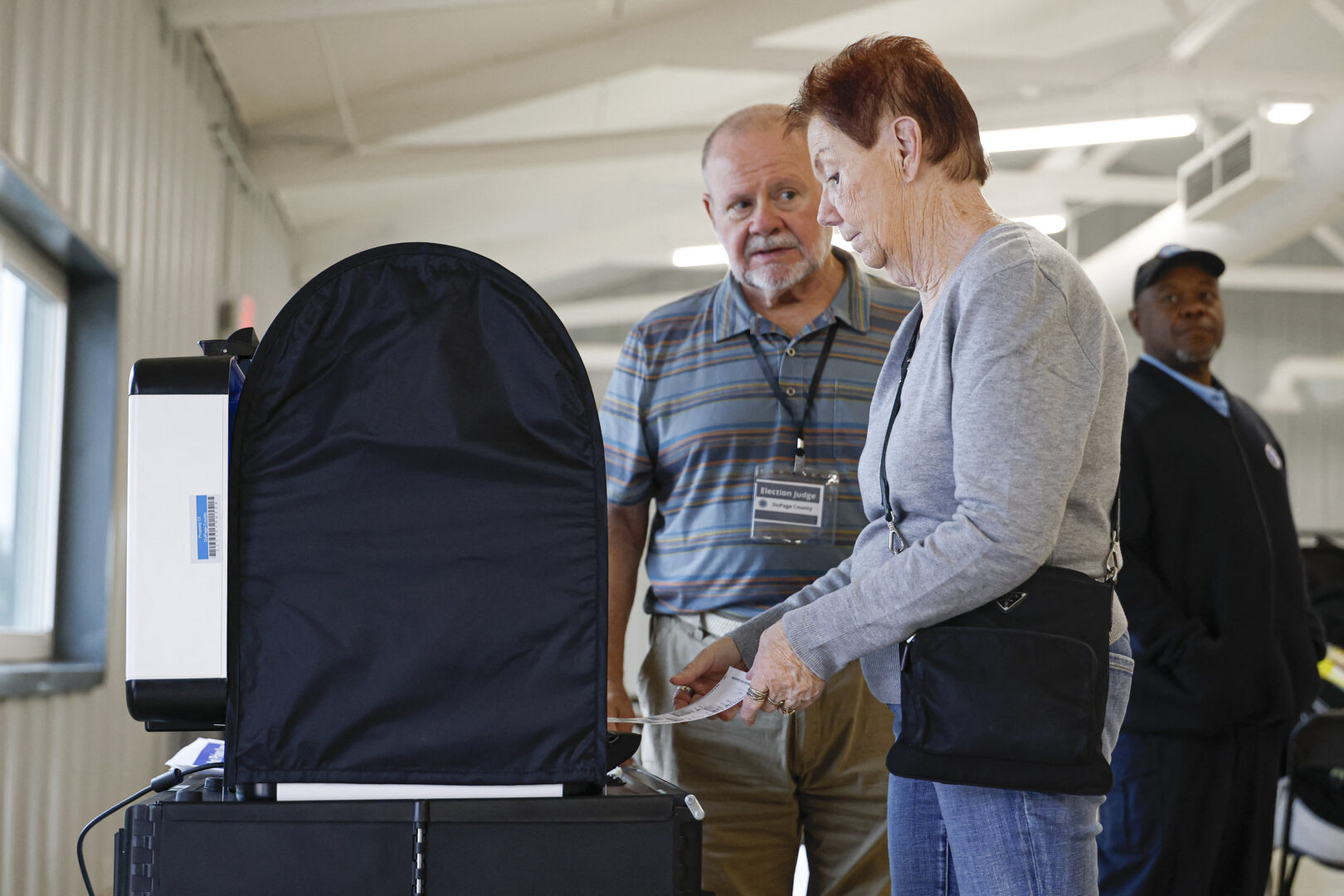 A woman casts her ballot on the second day of early voting ahead of the midterm elections at a polling place in Wheaton, Ill., on Sept. 25, 2026. (Kamil Krzaczynski/AFP via Getty Images)