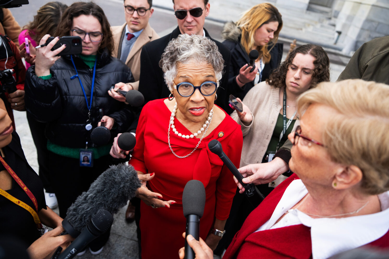 Reps. Joyce Beatty, D-Ohio, and Chellie Pingree, D-Maine, right, talk with reporters about the renaming of the Kennedy Center to include President Donald Trump’s name outside the Capitol on Dec. 18, 2025.