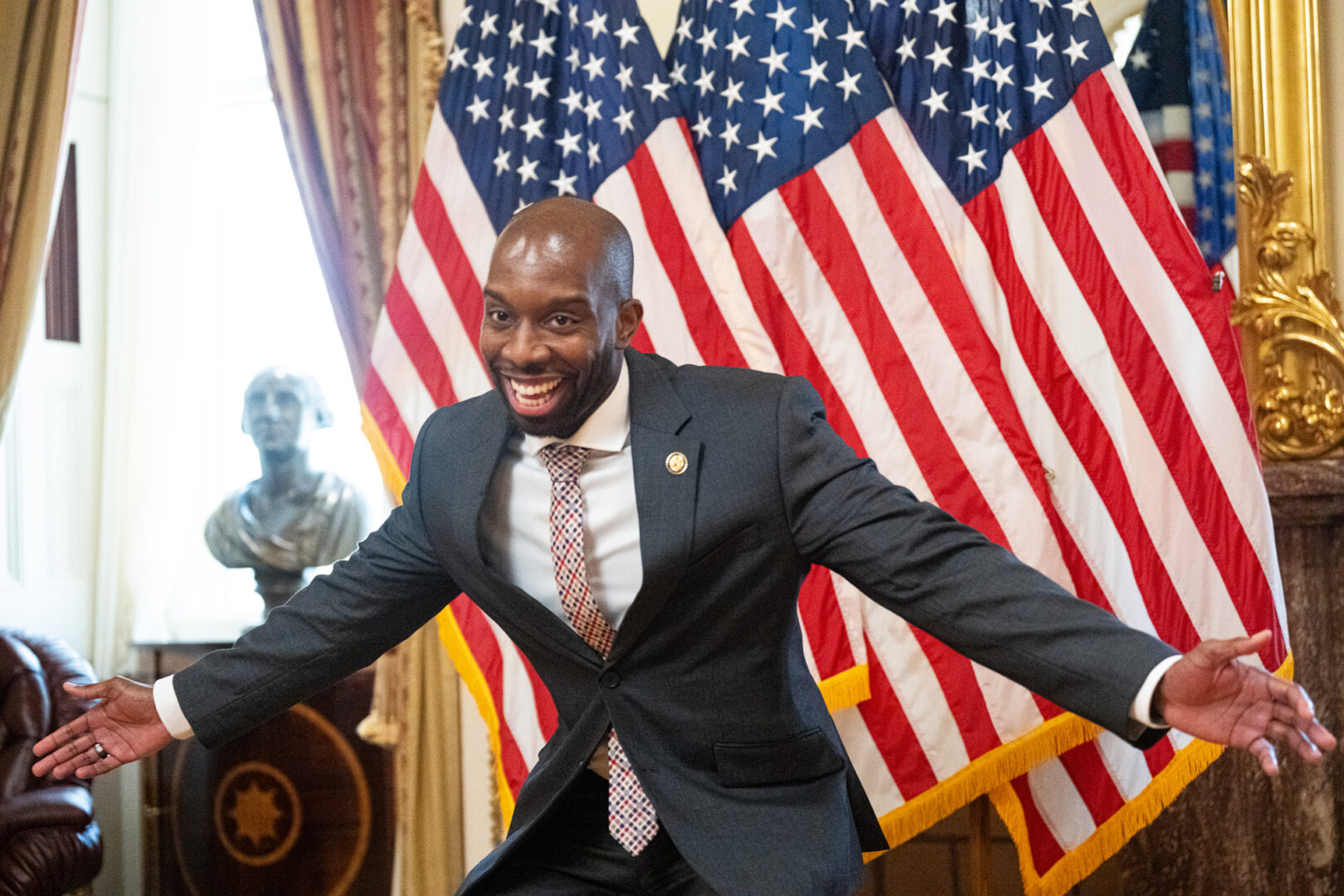 Rep. Everton Blair Jr., D-Ga., mugs for the cameras before his ceremonial swearing in photo-op in the Capitol on Tuesday. 