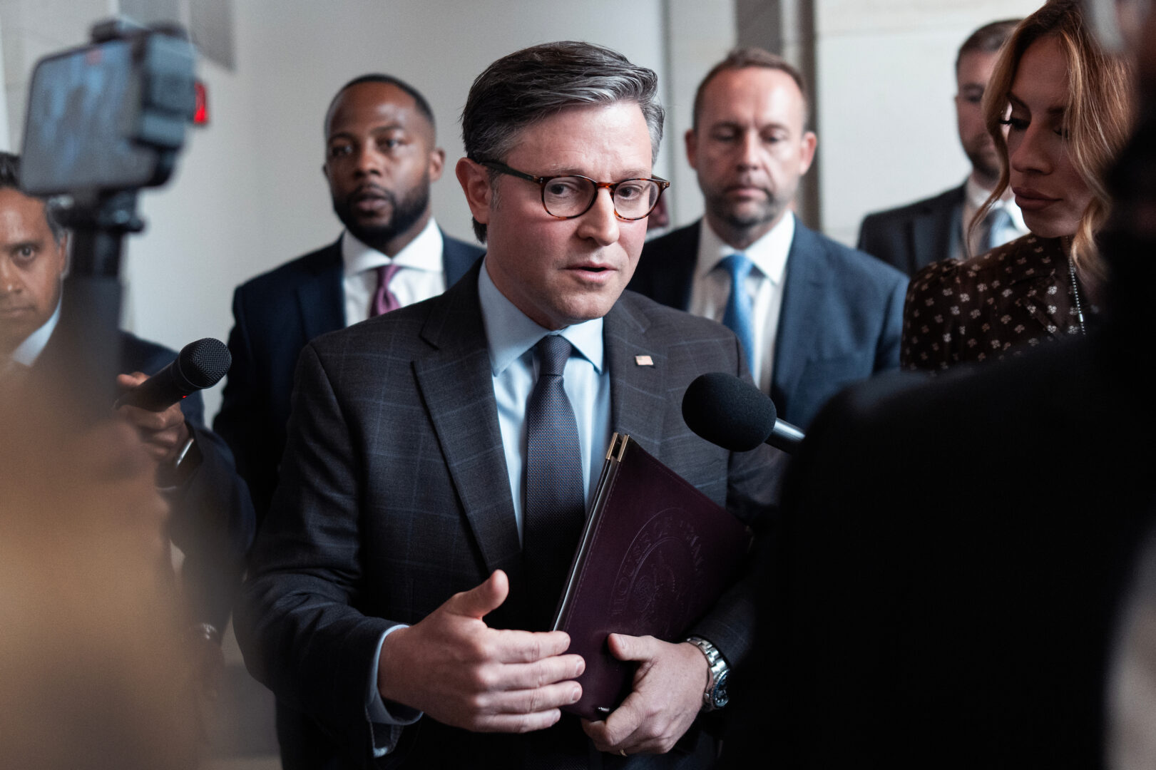 Speaker Mike Johnson, R-La., leaves a news conference in the Capitol Visitor Center after a meeting of the House Republican Conference on Tuesday.