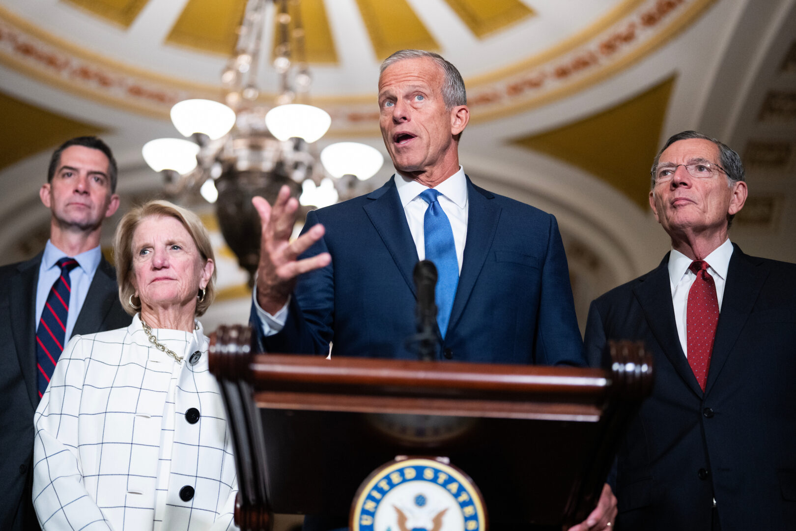 Senate Majority Leader John Thune, R-S.D., conducts a news conference after the Senate luncheons in the Capitol on Tuesday. Sens. Tom Cotton, R-Ark., left, Shelley Moore Capito, R-W.Va., and Majority Whip John Barrasso, R-Wyo., also appear. (Tom Williams/CQ Roll Call)
