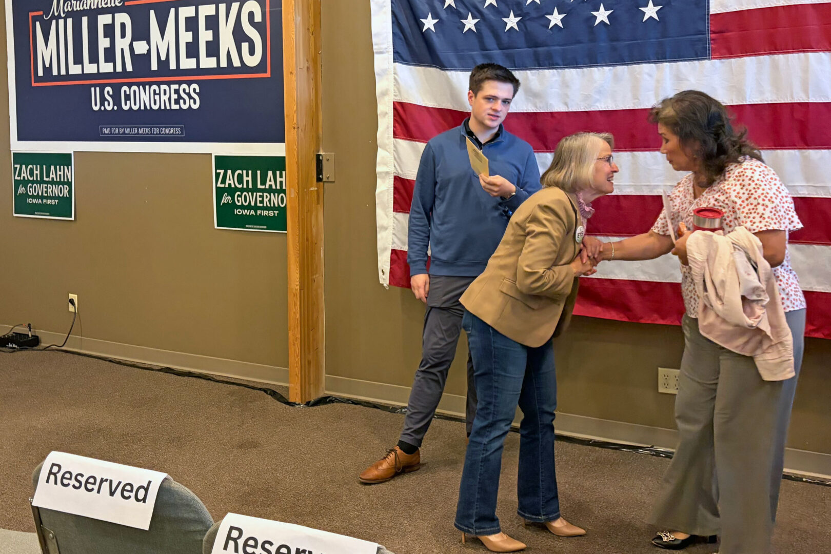 Iowa Republican Rep. Mariannette Miller-Meeks greets a constituent at a campaign event in Davenport.