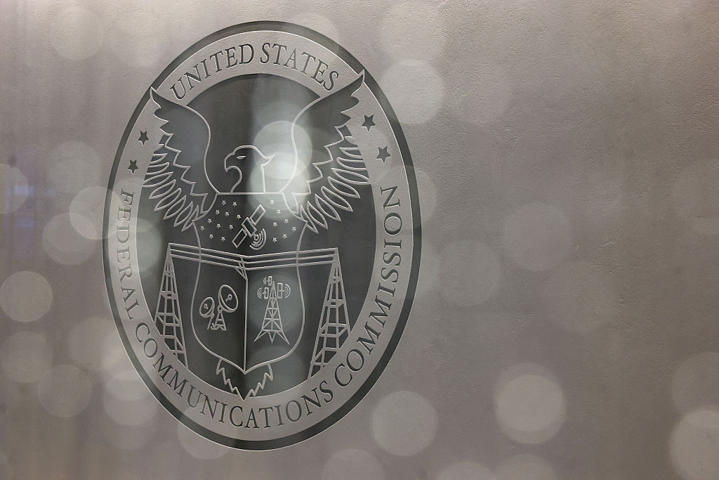 The Federal Communications Commission seal is seen in a briefing room earlier this year. 