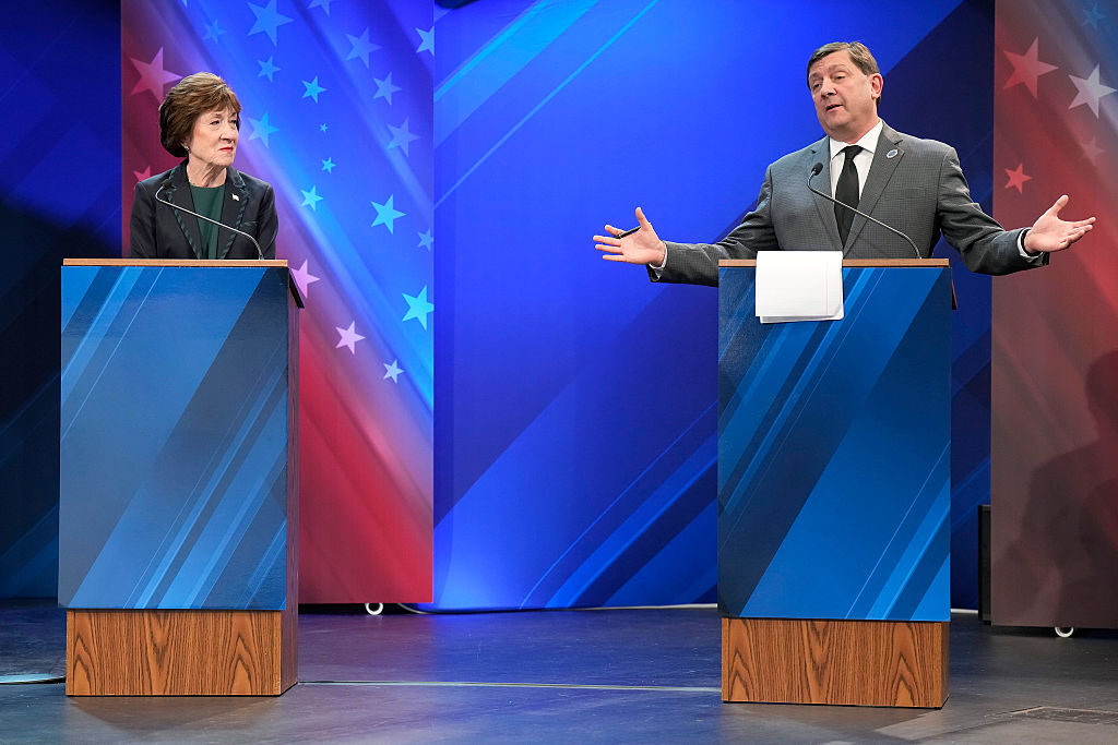 Sen. Susan Collins looks to Troy Jackson during a debate at Husson University in Bangor on Thursday.