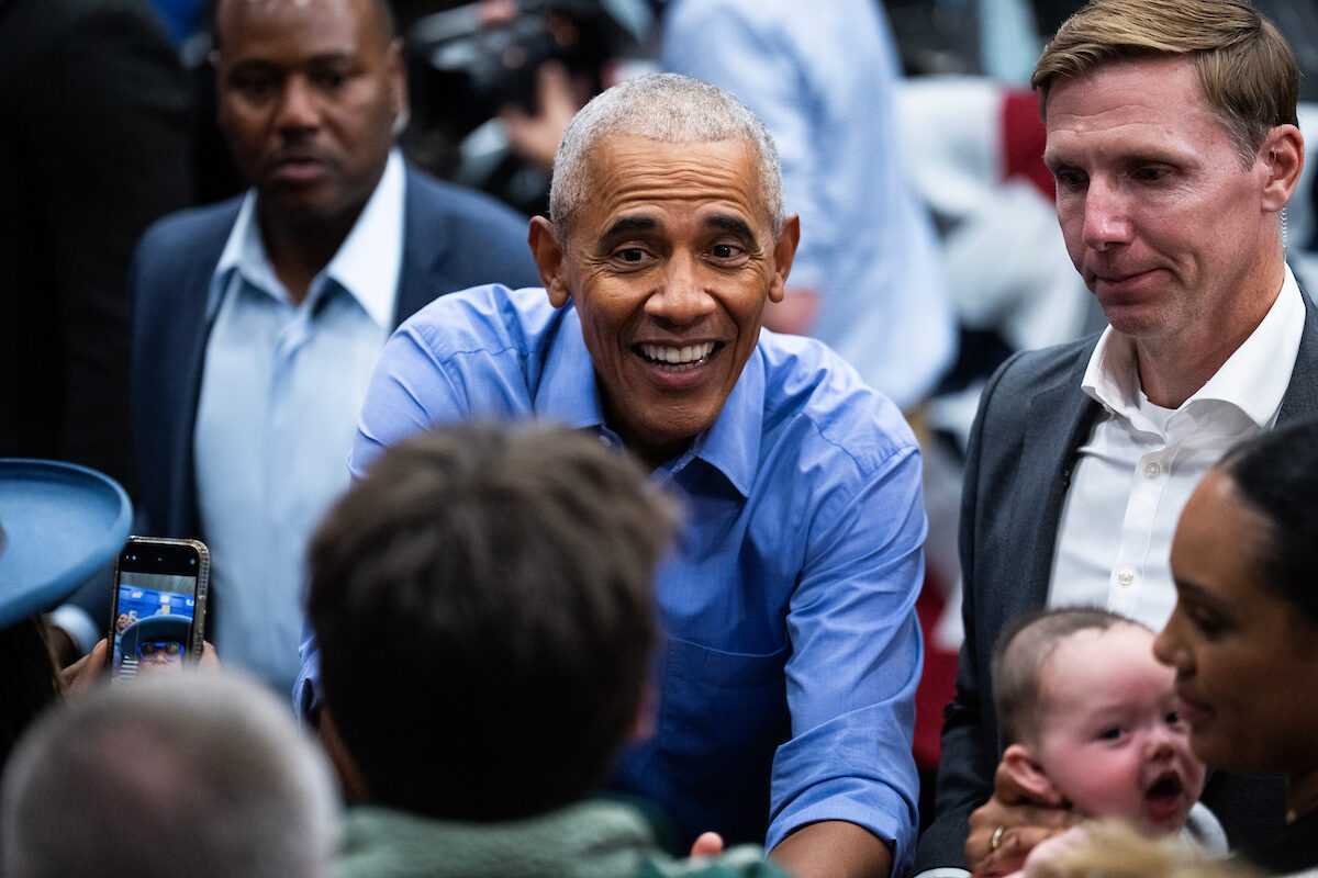 Former President Barack Obama greets guests during a campaign rally in Pittsburgh in October 2024. 